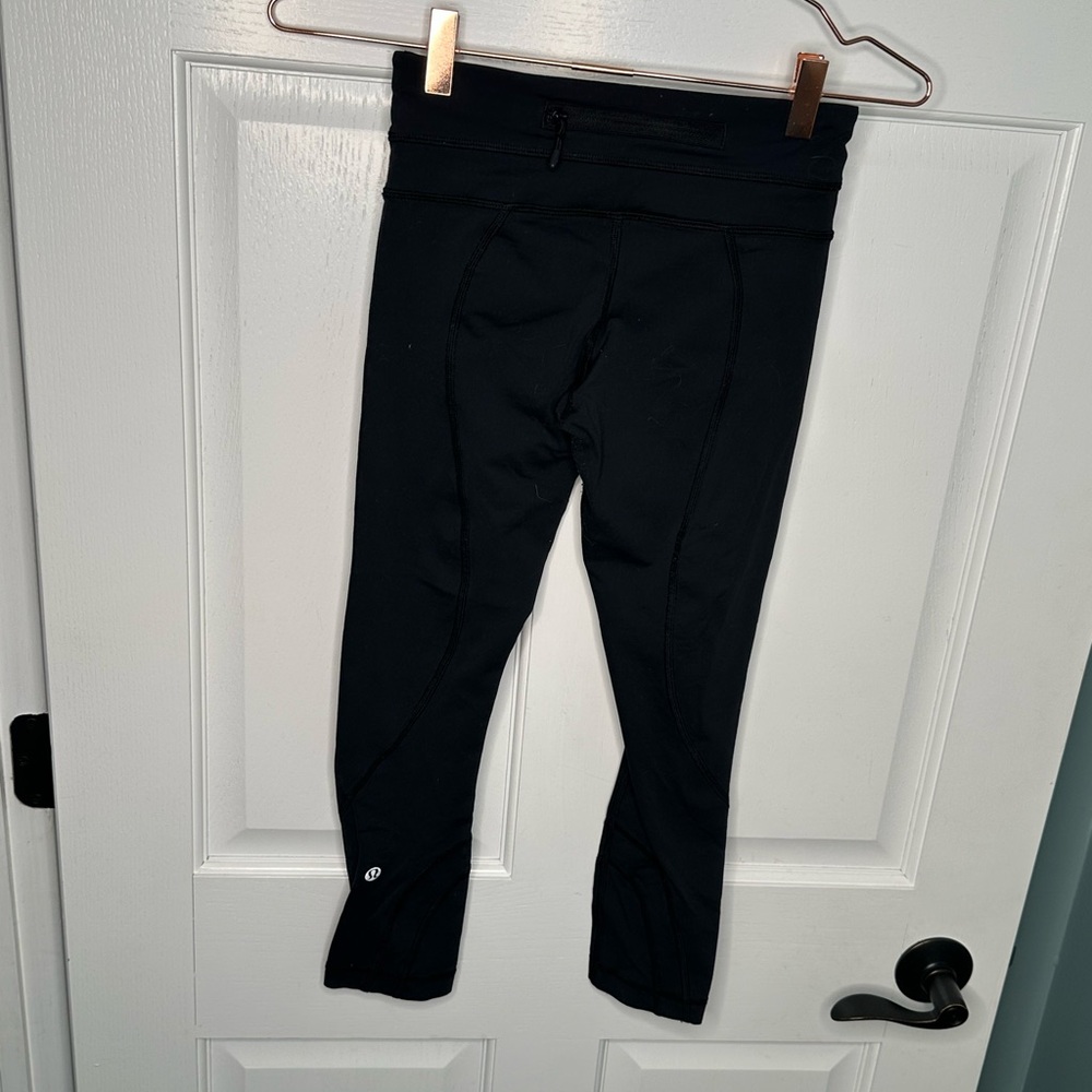 Lululemon Black Crop Leggings with Zip Pocket – Size 4, Mid-Rise Activewear - Picture 3 of 11